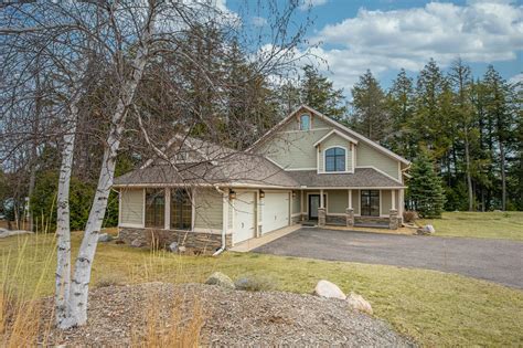 Plenty of storage for all the outdoor enthusiast or handy person with an attached 2 car garage and detached 1 car. . Homes for sale three lakes wi